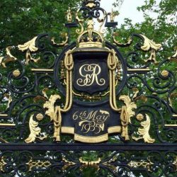Ornate gate with "GR" monogram, crown, and "6th May 1935" date.